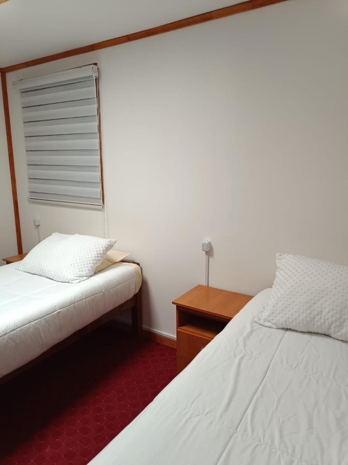 Hostal B&B Coastal Natales Пуерто-Наталес Екстер'єр фото